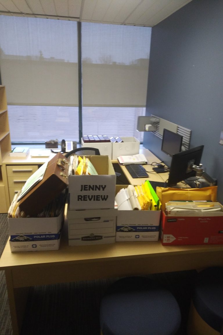 Boxes of files on a desk