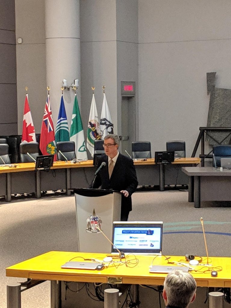 Ottawa's mayor giving a speech in a conference room