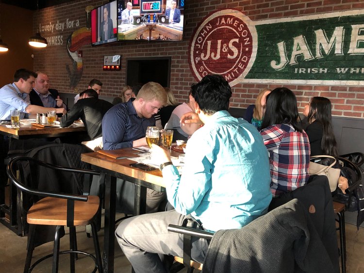 Employees enjoying a restaurant meal