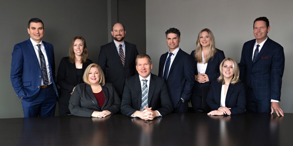 Hendry Warren's 9 partners sitting at a table